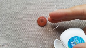 coser-boton-hilo-dental