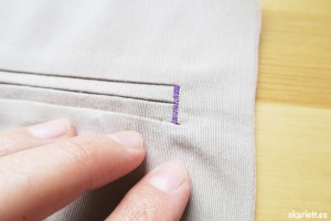 detalle de costura de refuerzo lateral en bolsillo ribeteado